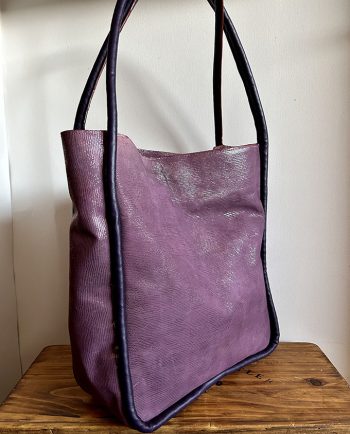 Bolso de piel malva brillante
