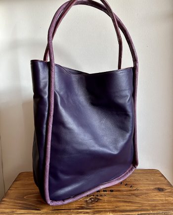 Bolso de piel color malva