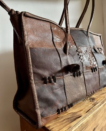 Bolso de viaje en un mix de pieles en marrón oscuro1